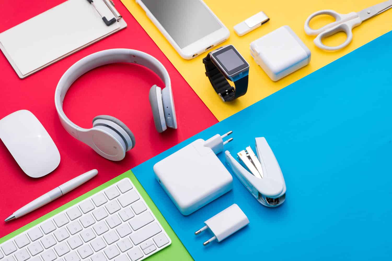 Well organised white office objects on colorful background